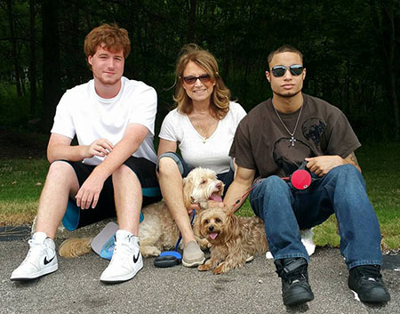 Robyn Sandys with her boys and dogs
